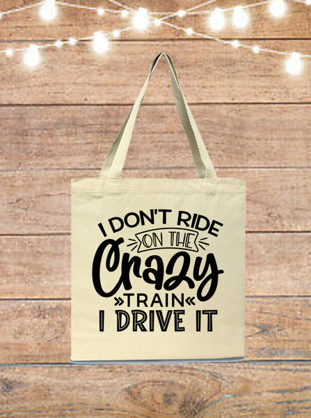 I Don't Ride On The Crazy Train, I Drive It Tote Bag